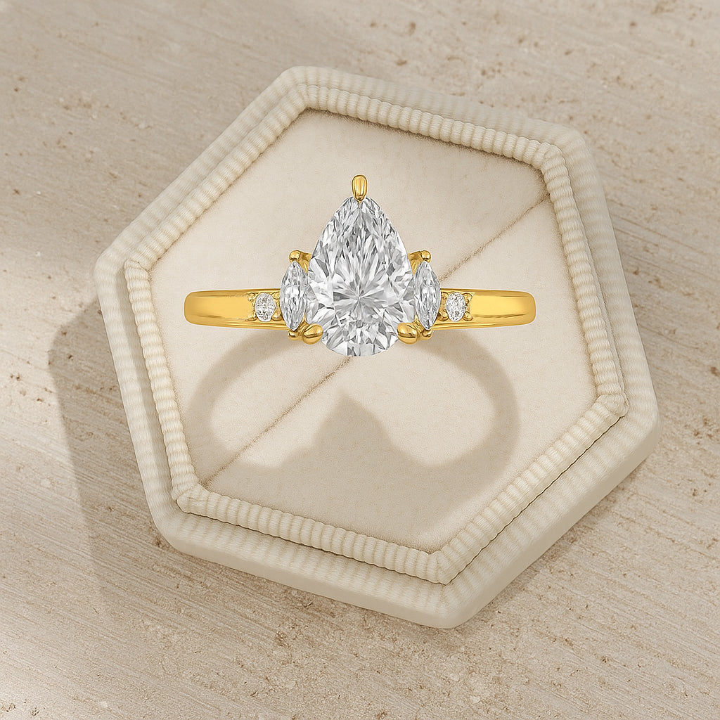 Elegant Gold-Plated CZ Ring with Pear and Marquise Cut Stones