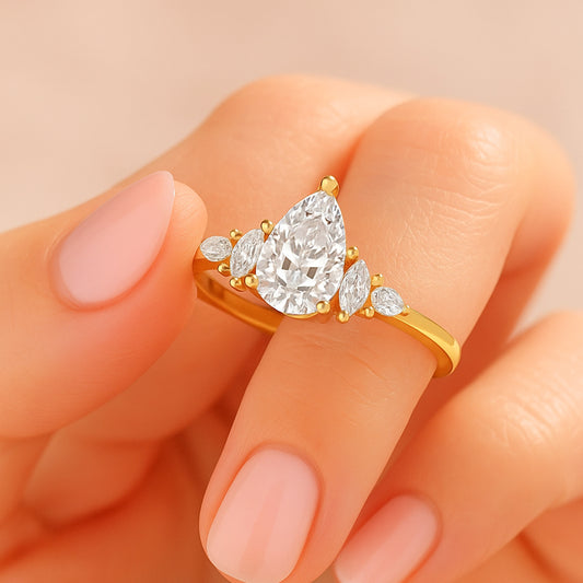 Elegant Gold-Plated CZ Ring with Pear and Marquise Cut Stones
