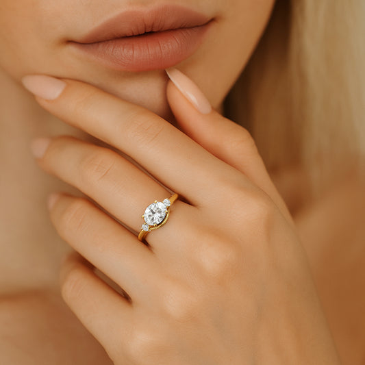 Elegant 3-Stone Oval CZ Ring in 18K Yellow Gold-Plated Setting