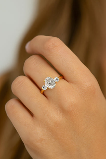 Trio of Elegance Three-Stone Engagement Ring - 18K Gold-Plated CZ