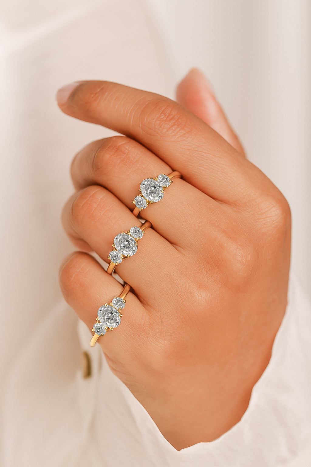 Trio of Elegance Three-Stone Engagement Ring - 18K Gold-Plated CZ