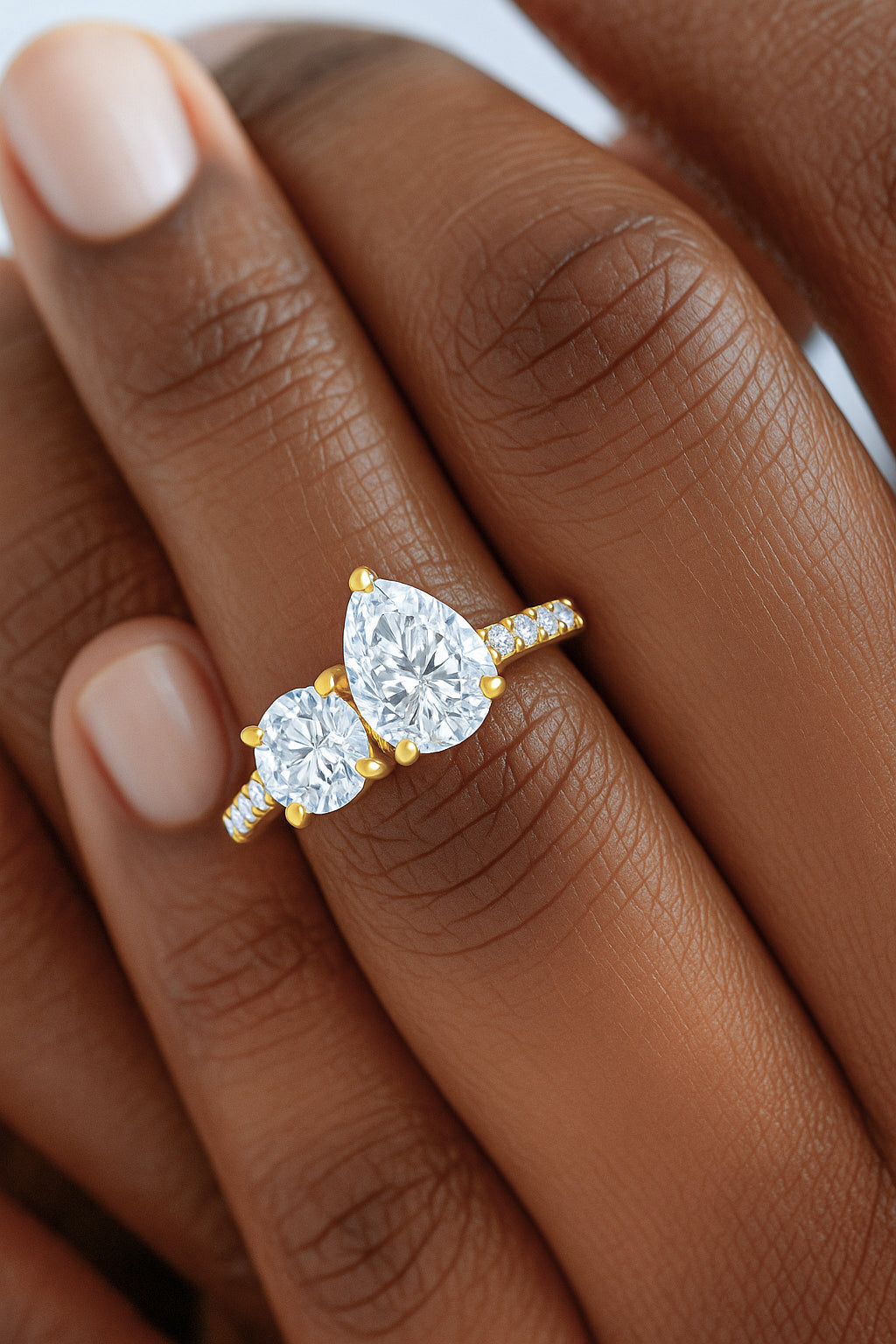 Crossover Round and Pear CZ Ring with Accent Stones in 18K Yellow Gold Plated