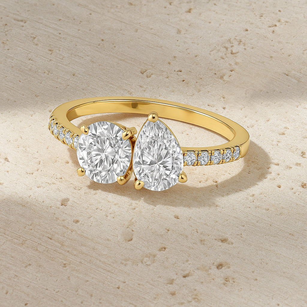 Crossover Round and Pear CZ Ring with Accent Stones in 18K Yellow Gold Plated