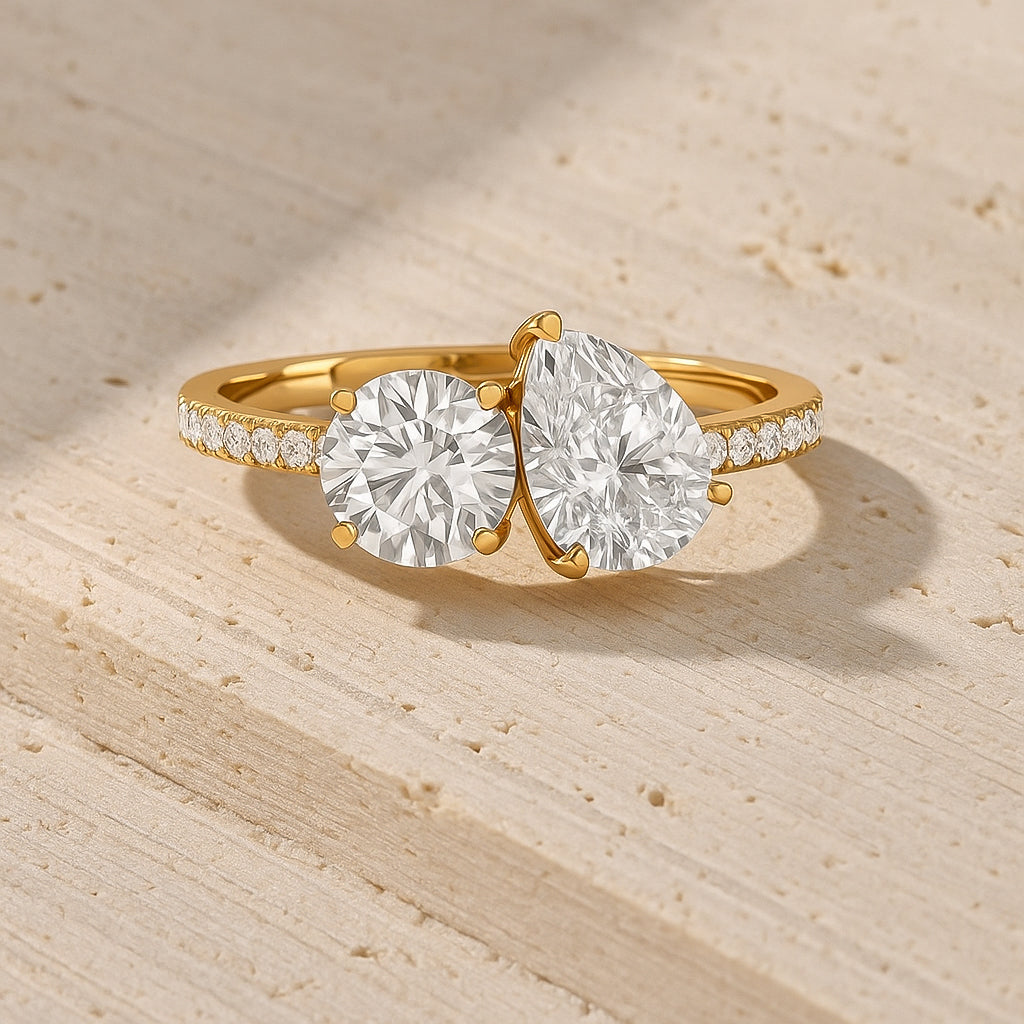 Crossover Round and Pear CZ Ring with Accent Stones in 18K Yellow Gold Plated